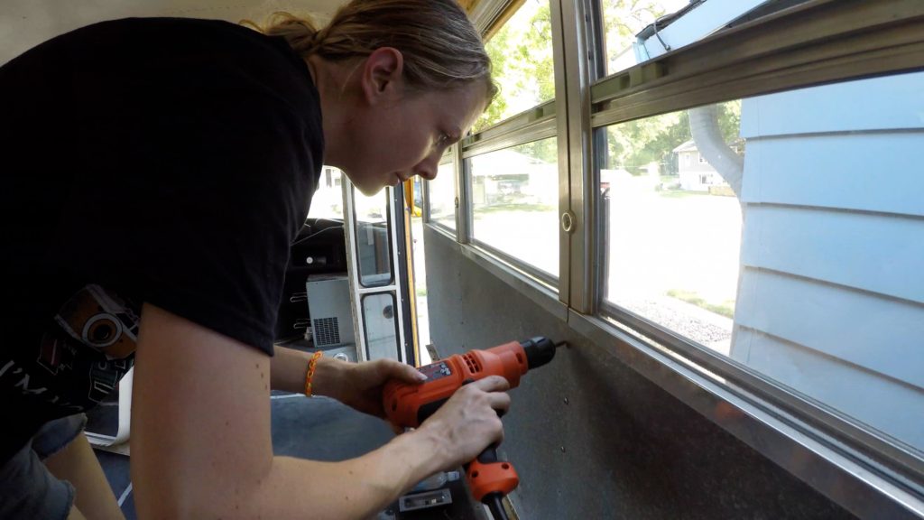 Removing windows and wall panels in our bus conversion