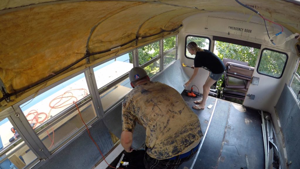 Removing windows and wall panels in our bus conversion