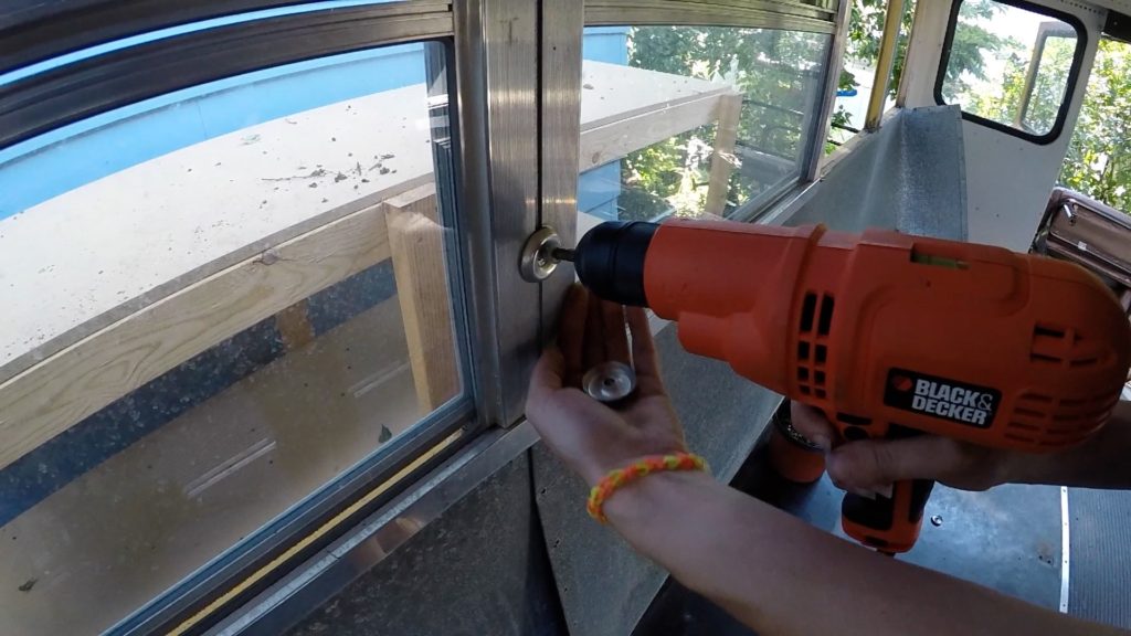 Removing windows and wall panels in our bus conversion